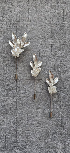 Boutonniere distintivos fistol padrinos novio boda civil religiosa

