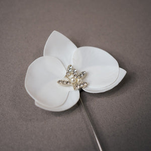 Fistol Distintivo para novio
boutonniere de orquidea para boda
